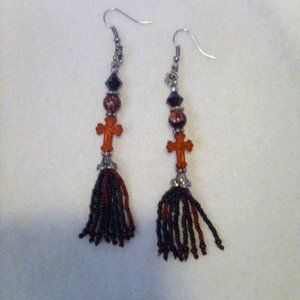 Hand Crafted  Black and Red beads earrings with a rust colored cross